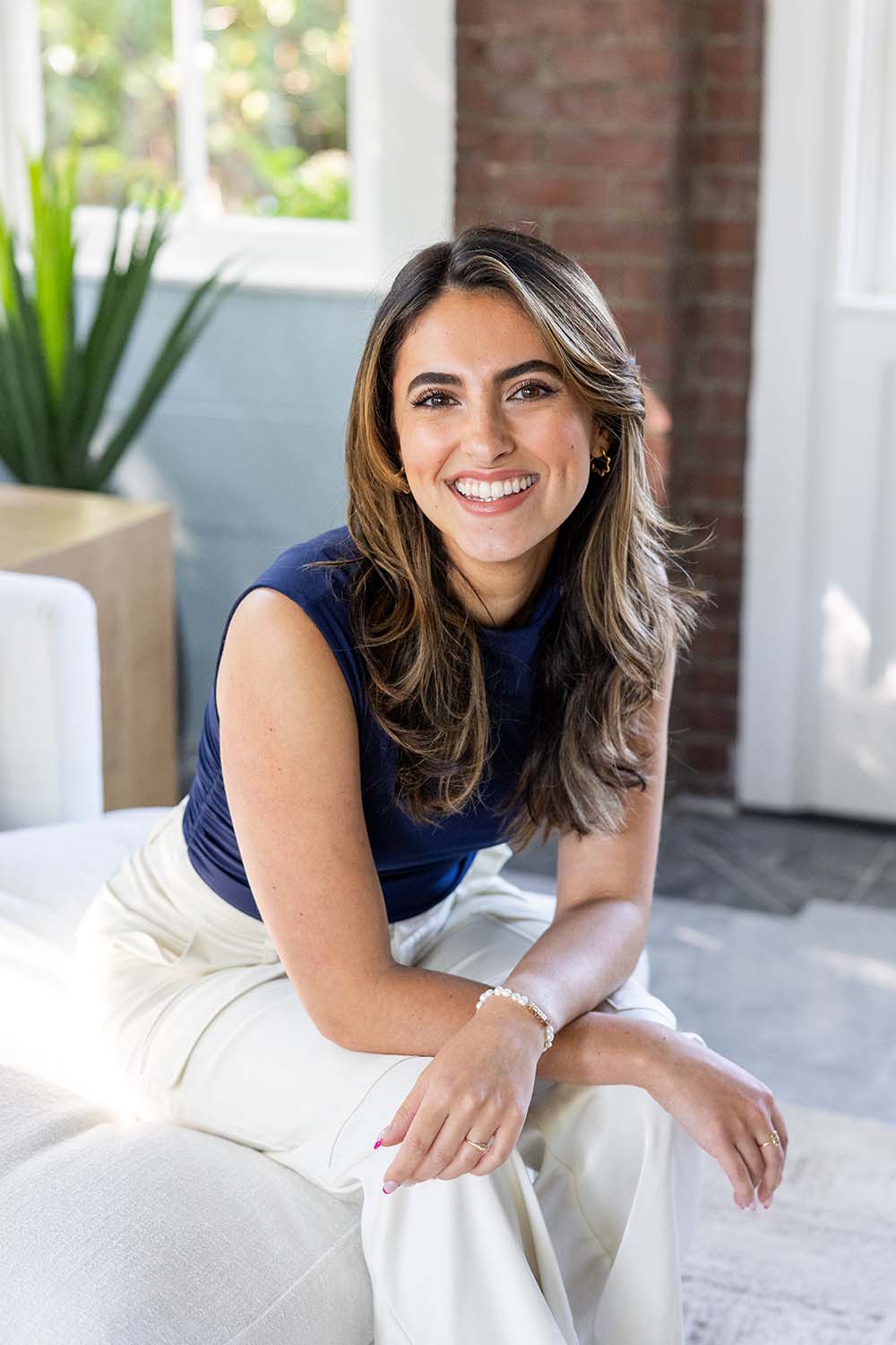 Brianna Chace, Interior Designer at Hill & Harbor, creating curated luxury interiors for custom builds and renovations.