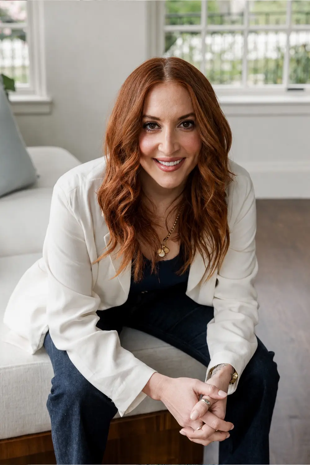 Trinity Amedeo, Director of Operations and Client Experience at Hill & Harbor, managing seamless project execution.